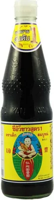 A bottle of Healthy Boy brand light soy sauce.