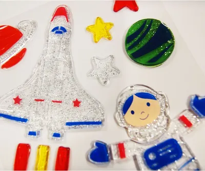 Zdjęcie produktu dla Naklejki żelowe na szybę - Astronauta - Brokat