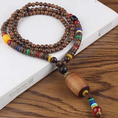 Immagine prodotto di Collana Alois in Legno con Ciondolo Colorato - Stile Etnico e Bohémien KP34071