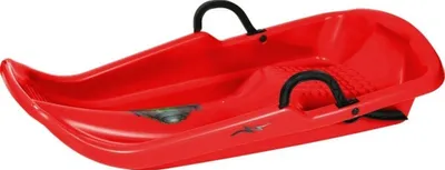 A red plastic sled with black handles, shown from a diagonal angle against a white background.
