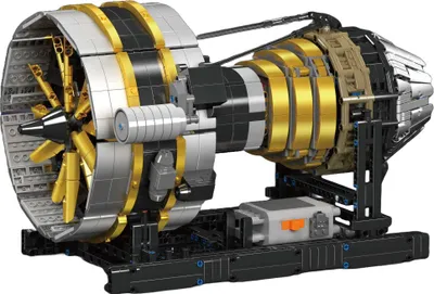 A detailed model of a jet engine on a black display stand.