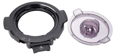 A dark gray ring-shaped component and a transparent purple lid are shown on a white background.