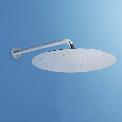 A chrome shower head mounted on a wall arm against a blue background.