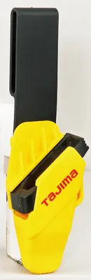 A yellow and black tool holster with the brand name 'Tajima' visible.