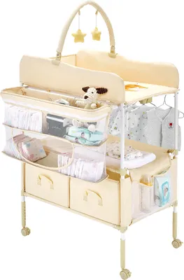 A baby changing station with storage and hanging clothes.