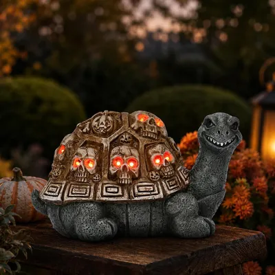 Productafbeelding van Halloween schildpad met 10 doodshoofden & rode oplichtende ogen