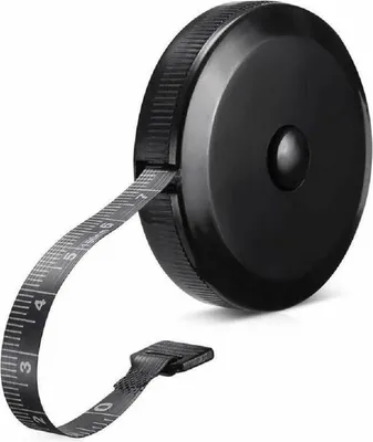 A black retractable tape measure with its tape extended.
