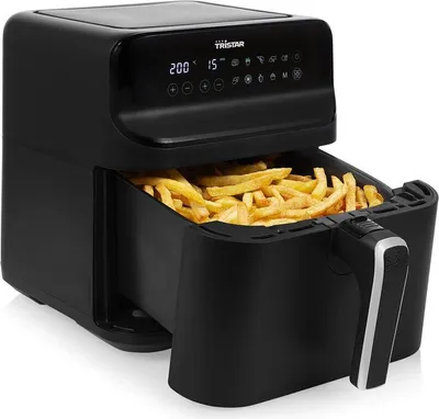 A black Tristar air fryer filled with french fries, with its digital display showing temperature and time.