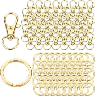 Zdjęcie produktu dla Karabińczyk do kluczy ze stali nierdzewnej 80 sztuk, złoty, obrót o 360 stopni