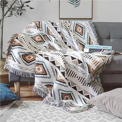 Produktbild von Unyqoos® Boho-Decke – gestrickte Kuscheldecke mit Fransen, aztekisches Geometriemuster, wendbar als Sofa‑ oder Tagesdecke, 180 x 260 cm, für Zuhause & Reisen