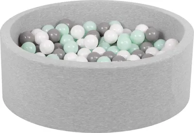 A light gray ball pit filled with white, gray, and mint green balls.