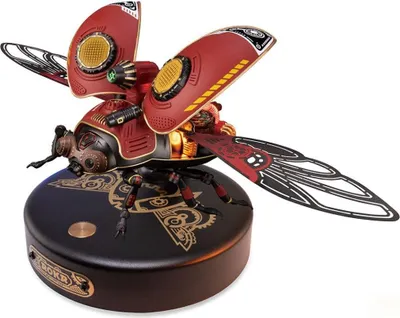 A steampunk-themed mechanical beetle model on a circular base.