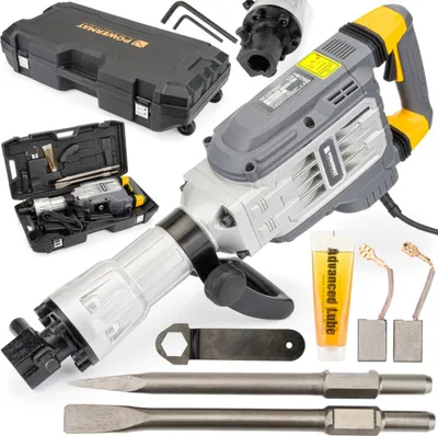 A collection of tools and accessories for a demolition hammer, laid out on a white background.