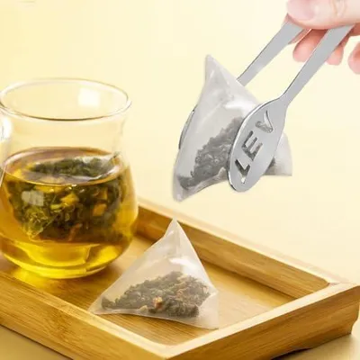 Produktbild von Teebeutelpresse aus Edelstahl – Teefilter-Löffelklemme
