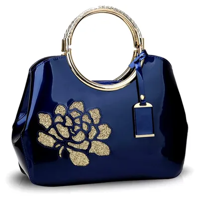 Produktbild von Damen Clutch aus mit abnehmbarem Schultergurt und blauer Blume