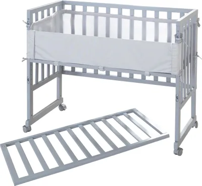 A grey crib with a white mesh liner and a separate wooden base is shown against a white background.