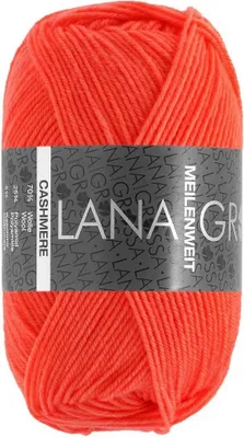 A ball of orange yarn with a label.