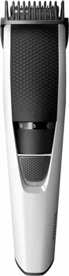 A close-up, front-facing studio shot of a Philips beard trimmer.