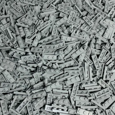 A pile of small, light gray LEGO bricks.