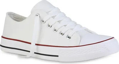 A white low-top sneaker with red and black accents on the sole.