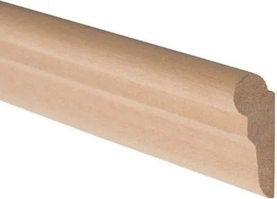 A close-up, angled view of a piece of wooden trim with a decorative profile.
