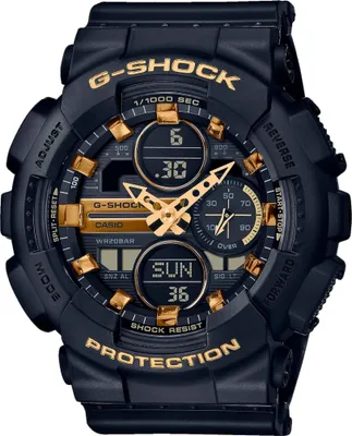 A close-up studio shot of a black and gold G-Shock watch.