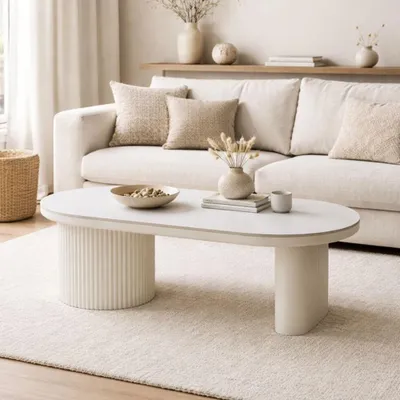 A living room setting with a couch and coffee table.