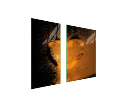 Immagine prodotto di Piastre copri fornelli 2 pezzi 75x52 Copri piano cottura in Vetroceramica tagliere in vetro cuore arancione