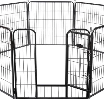 A black metal pet playpen with an open gate.