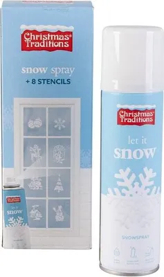 A box of Christmas Traditions snow spray and stencils next to the spray can.