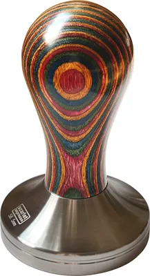 A close-up studio shot of a coffee tamper with a multicolor wooden handle and a silver base.