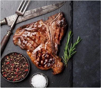 Produktbild von Spritzschutz Herdabdeckplatte Schneidebrett aus Glas Gegrilltes T-Bone Steak 1-Teilig (60x52cm)