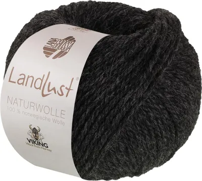 A ball of dark gray wool yarn with a label wrapped around it.