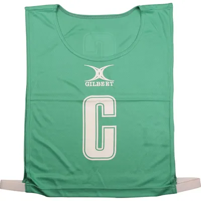 Immagine prodotto di Gilbert, pettorine da netball monocromatiche, taglia media, colore verde