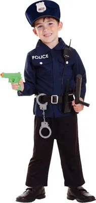 A young boy dressed in a police officer costume, holding a toy gun and a baton.