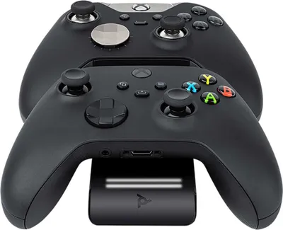 Produktbild von PDP Ultra Slim Dual Ladestation, Magnetische Anschlüsse,Mikrosaugmaterial, Xbox 049-009-EU