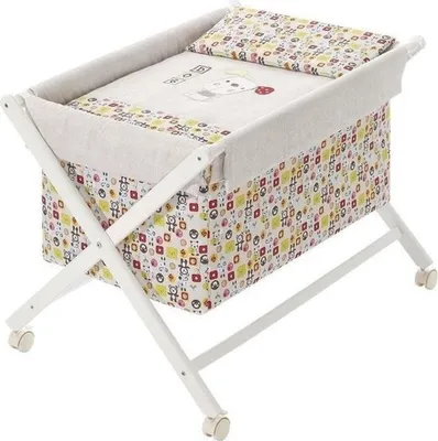 Immagine prodotto di Interbaby - Culla in X - Legno bianco - 55X90X72 con vestiti e biancheria - Mod. Orso Osito - Beige