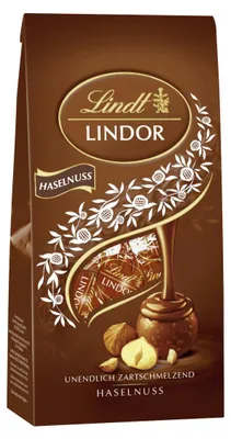 Zdjęcie produktu dla Lindor, praliny z orzechami laskowymi w delikatnej mlecznej czekoladzie, 100g