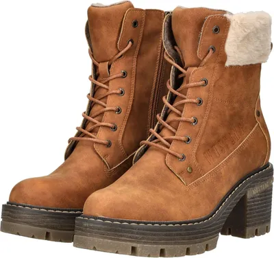 A pair of brown boots on a white background.