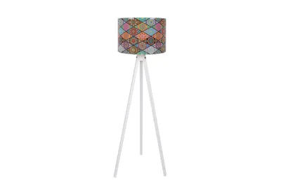 A floor lamp with a patterned lampshade on a white background.