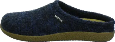 A side view of a navy blue slipper with a brown sole.