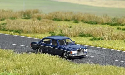 Produktbild von Busch 5661 - 1/87 / H0 Mercedes-Benz W 123 - Neu
