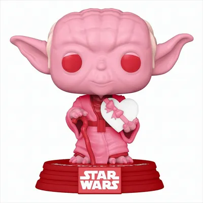 A pink Funko Pop! vinyl figure of Yoda from Star Wars, holding a heart-shaped box of chocolates.