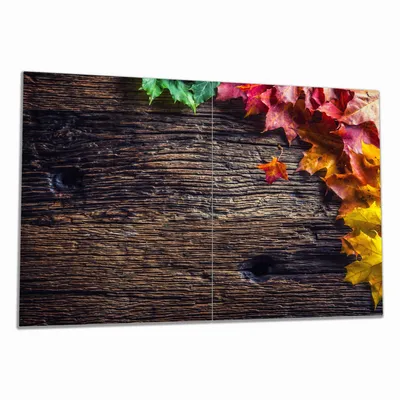 Produktbild von Wallario Herdabdeckplatte aus Glas, Größe 80 x 52 cm 2-teilig, Motiv Herbstblätter auf altem Holz