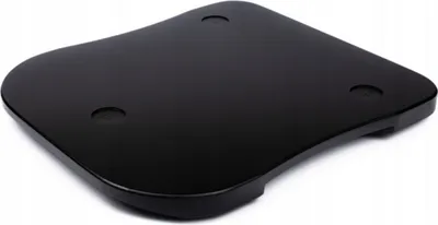 A black, glossy, curved board with three circular indentations, likely a kitchen appliance accessory.