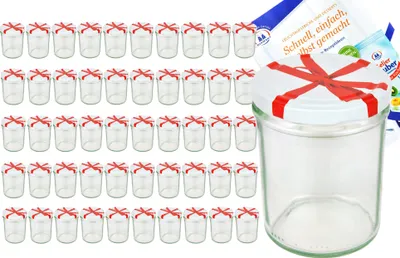 A set of glass jars with red ribbon decoration and recipe booklets.