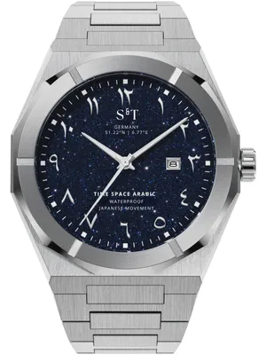 A close-up, front-facing view of a men's wristwatch with a dark blue, speckled dial and Arabic numerals.