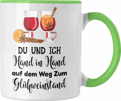 Produktbild von Trendation - Glühwein Tasse Lustig Spruch Glühweinbecher mit Henkel Doppelwandig Glühweintassen Gläser Weihnachtsmarkt Becher Tassen Geschenk - Hand In Hand Zum Glühweinstand (Grün)