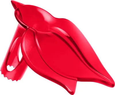 A red plastic citrus juicer shaped like lips against a white background.