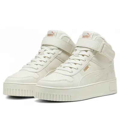 A pair of white Puma Carina Street Mid WTR shoes for women are displayed against a white background.
